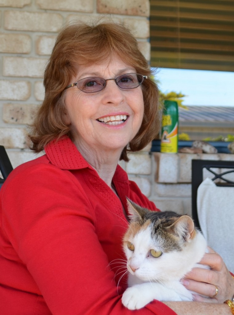 This is my mother-in-law, Sandy Curtis, with her cat, Zara.