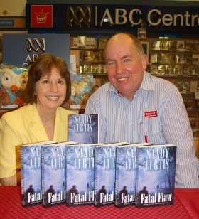 Sandy Curtis with Dymocks Booksellers Bundaberg owner Phil Freeman