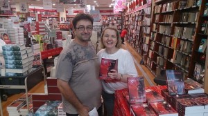 Mark Norris gets his niece's book signed by Cheryse Durrant at Dymocks Carindale